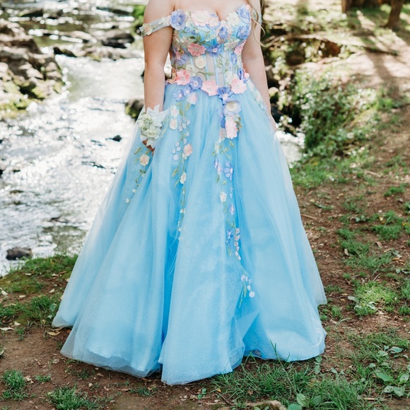 Blue lace prom dress with multicolored flowers sewn on. - Picture 3 of 4